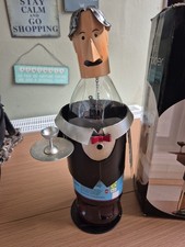 novelty wine holder William