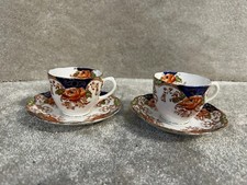 VINTAGE PAIR OF ENGLISH FINE BONE CHINA TEA CUPS AND SAUCERS