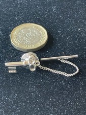 Key tie pin with chain -