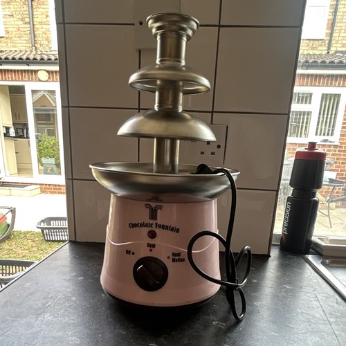 Chocolate fountain brand new - chocolate,