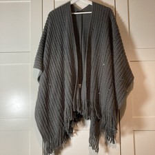 Women’s grey poncho by Quiz.