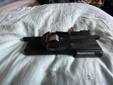 manfrotto 454 macro focusing rail with a manfrotto 384  Dove Tail Plate Adapter 