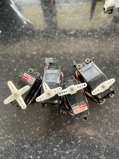Four Standard Sized Vintage Futaba Servos Used.