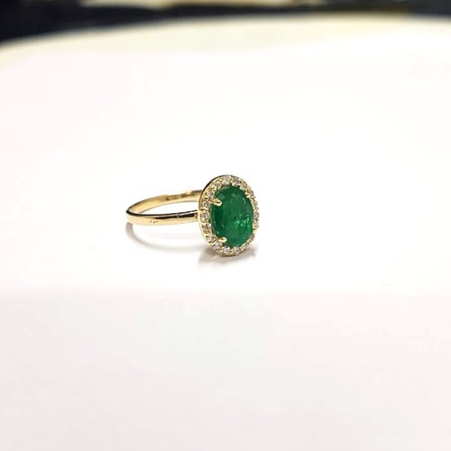 Oval emerald and - oval, diamond