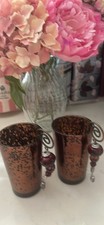 A pair of copper, bronze and