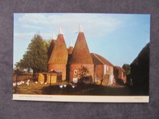VINTAGE POSTCARD OF OAST HOUSES  IN A KENTISH VILLAGE