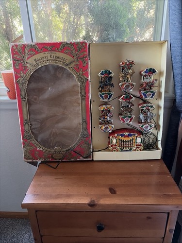 Vtg holiday carousel - vtg,