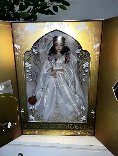 Disney limited edition doll - limited,