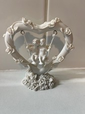 Pair of Resin Cherubs sitting