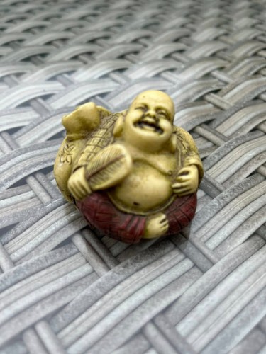 Vintage miniature laughing