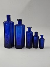 5 BLUE POISON BOTTLES