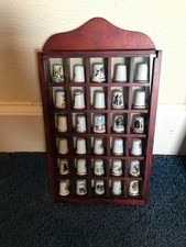 Wall mountable wooden thimble