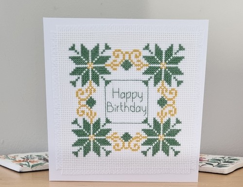 Hand stitched completed cross - stitched,