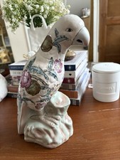 Ceramic parrot figurine with
