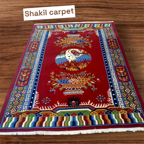 Tibetan hand knotted bird - hand,