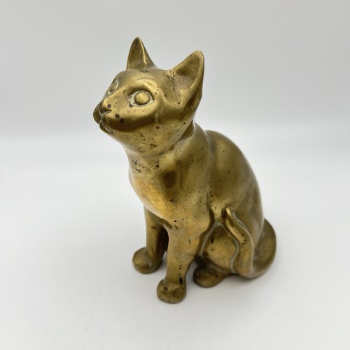 Vintage solid brass sitting - solid,