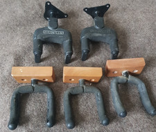 5 Guitar wall hangers.