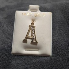 14kt. gold charm A initial