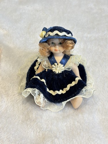 Two small dolls - two,
