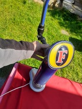 Fosters Lager Beer Pump .  man