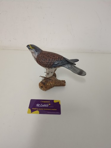 Wooden carved peregrine falcon - peregrine,