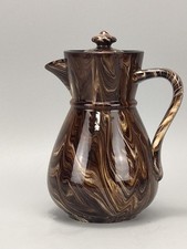 Antique agateware milk jug
