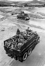 An American tank stands guard