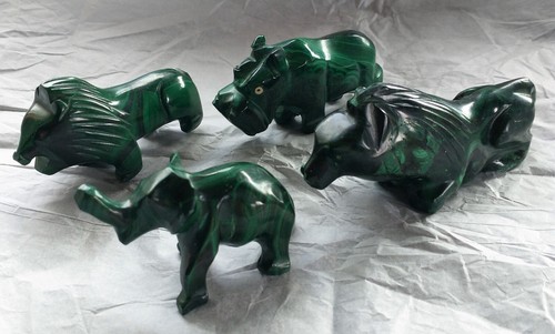 Four hand carved - hand,