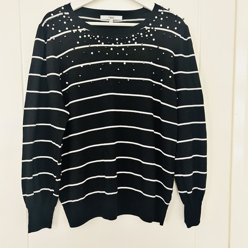 Next black white striped - next,