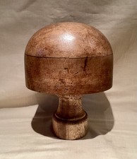 An Antique Wooden Hat Block On