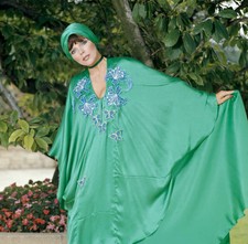 Joan Collins wearing the