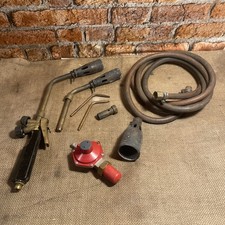 Sievert  torch with 4 burner heads,hand control, tubing and bottle adapter.