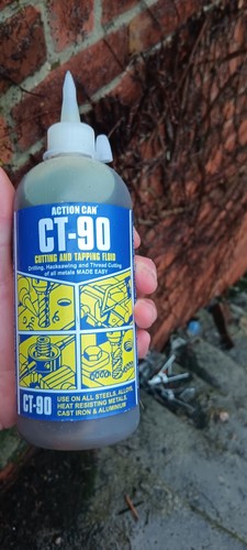 Cutting and tapping oil - and,