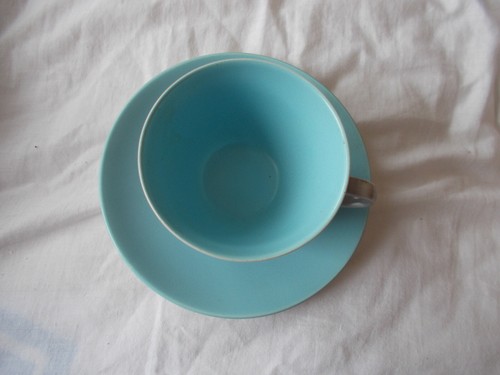 Poole pottery cup and - /cup, saucer