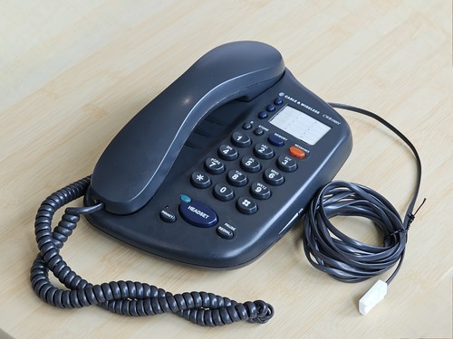 Cable wireless telephone - &,