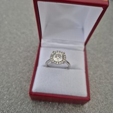 Moissanite halo ring in