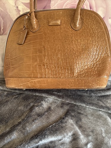 Genuine osprey brown tan - brown,