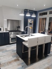 Quatropi high bar stool in faux white leather