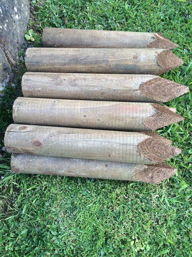 Wooden garden edging stakes