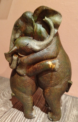 Hugging standing elephant - ,