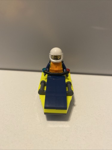 Lego policeman with jetboat - with,
