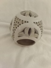 Carved African inspired stone tealight holder