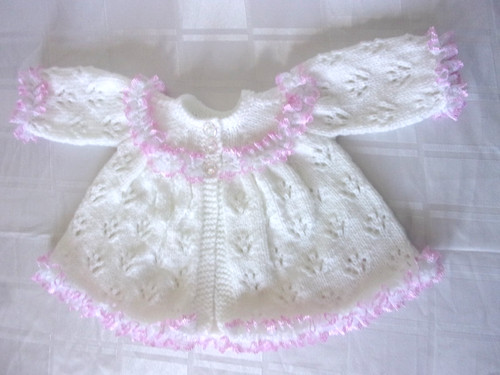 Hand knitted white with - hand,