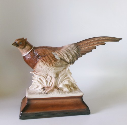 Mounted ceramic figure a - figure,