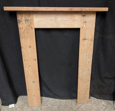 A RECLAIMED PINE FIRE SURROUND MADE FROM OLD RECLAIMED FLOORBOARDS FS0437