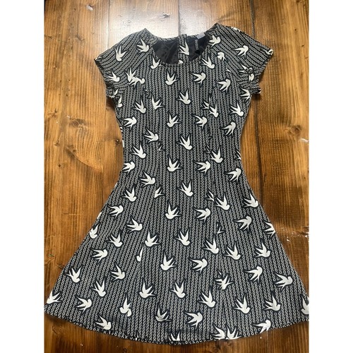 Divided black white bird - black,