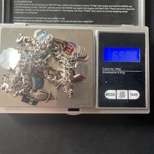 Vintage (1960/70s) Sterling Silver /silver Charm Bracelet with 38 Charms.