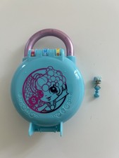 Shopkins Lil Secrets Bubbling Beauty Spa Playset with the mini doll and code. 