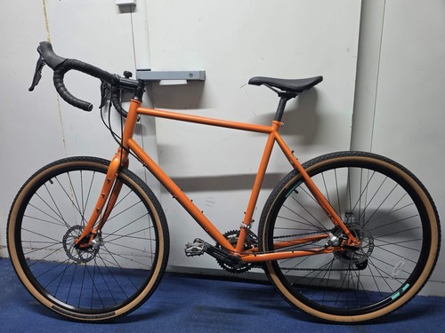 Orange 700c gravel bike - gravel, drop