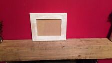 photo frame = wood frame with distressed white paint effect